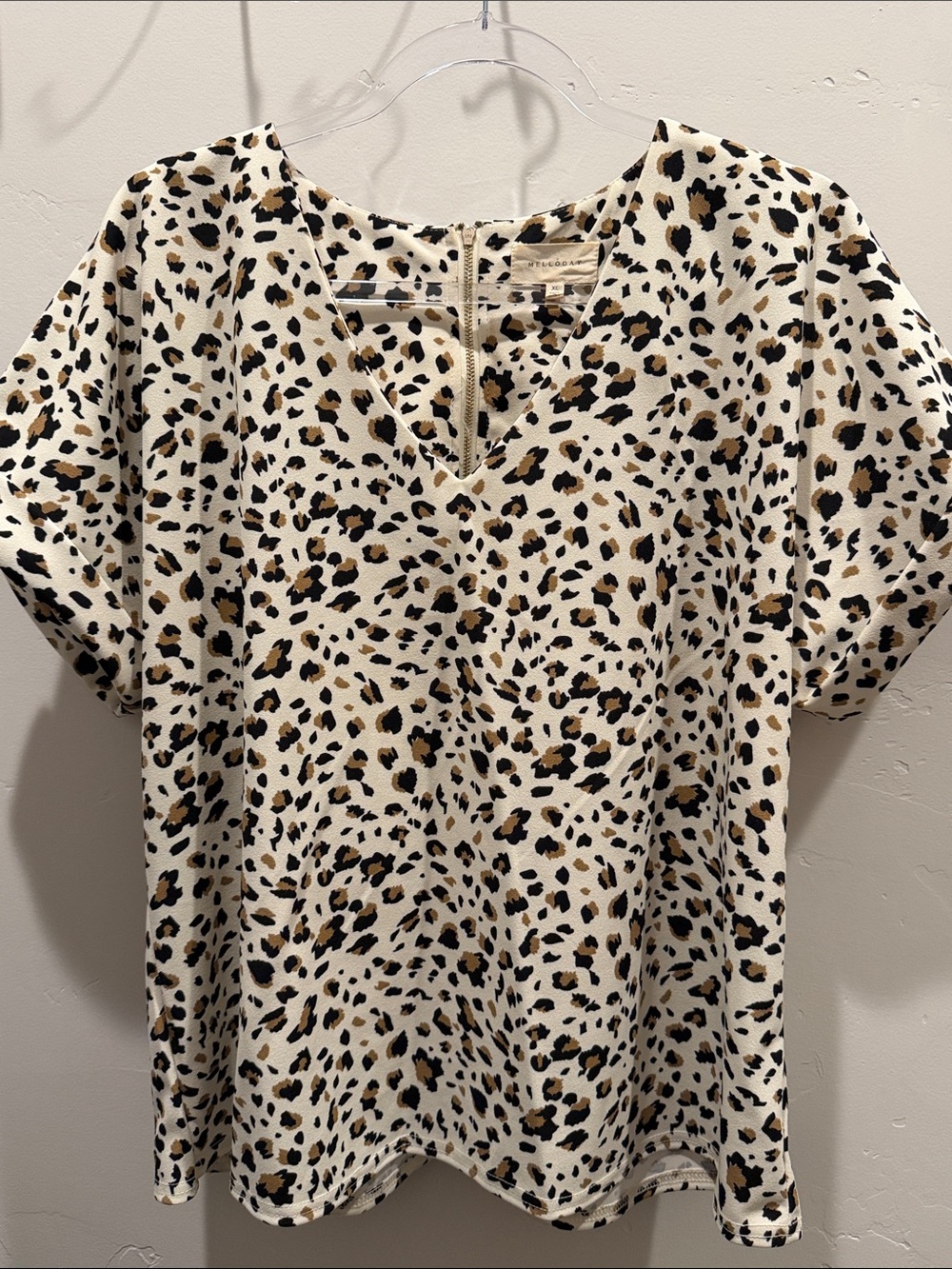 MELLODAY Cream Leopard Print V-Neck Blouse with Black and Brown Spots